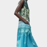 No.6 Tierney Dress Bellport Blue side profile with fluid pleated skirt and floral print