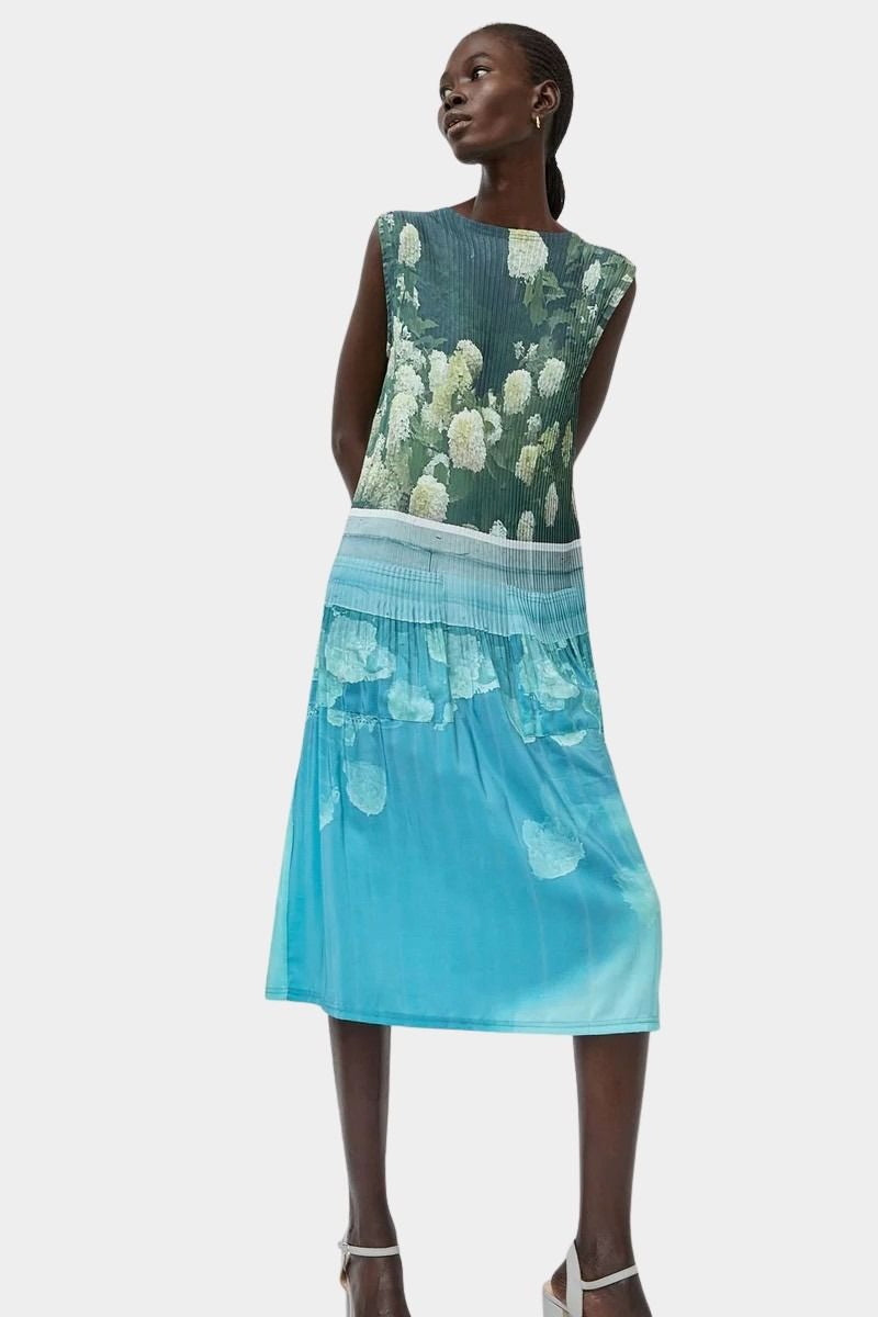 No.6 Tierney Dress in Bellport Blue with layered pleats and soft watercolor floral print
