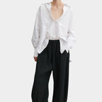 Rachel Comey Ashbolt pant in black, front view highlighting wide-leg shape and fluid texture