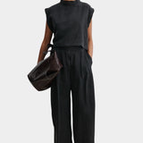 Rachel Comey Bacchus top in black, full look showing relaxed fit, wide arm openings, and fluid drape