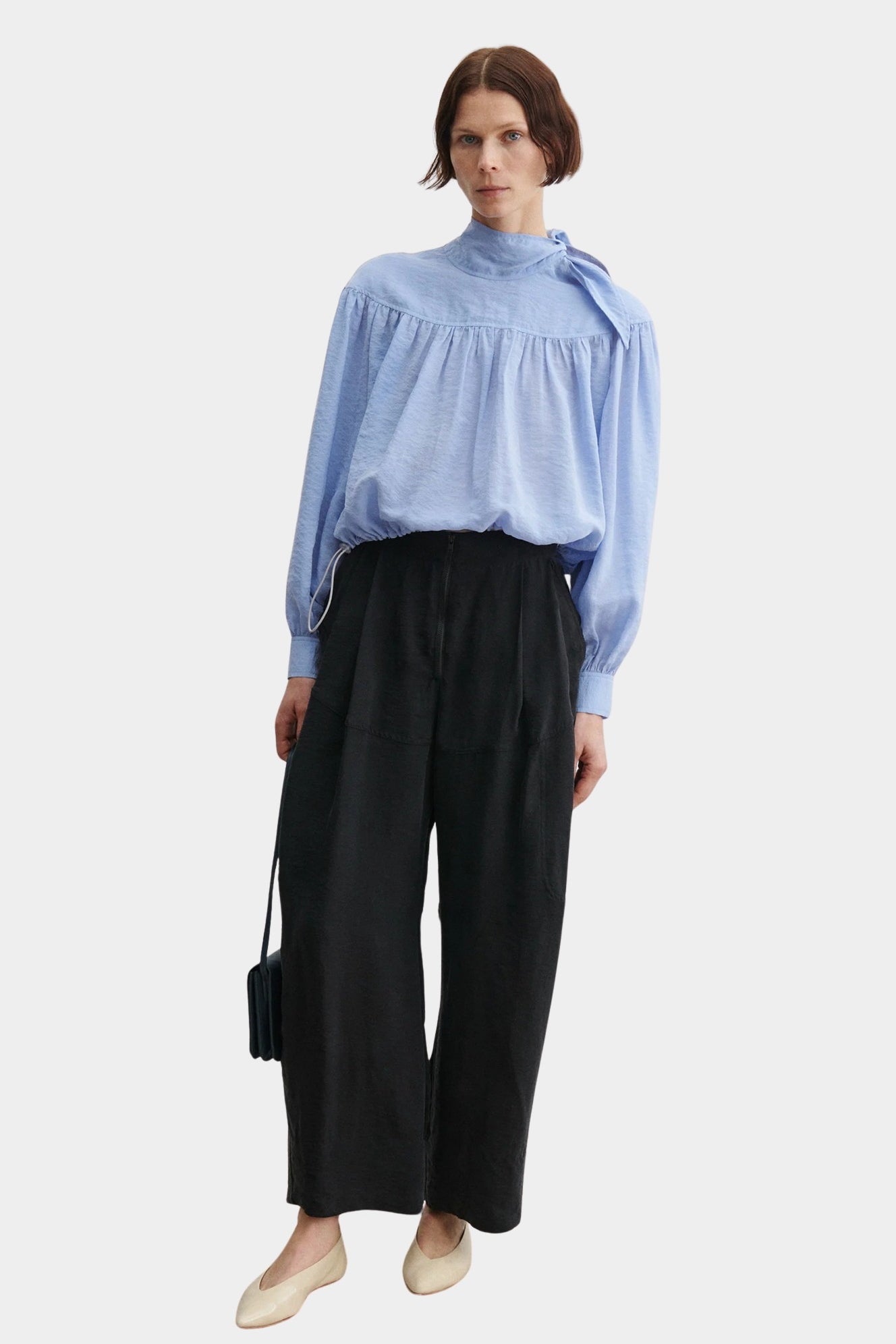 Rachel Comey Dini pant in black, full look showing relaxed wide-leg fit and fluid drape