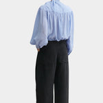 Rachel Comey Dini pant in black, back view highlighting relaxed fit and elastic waistband