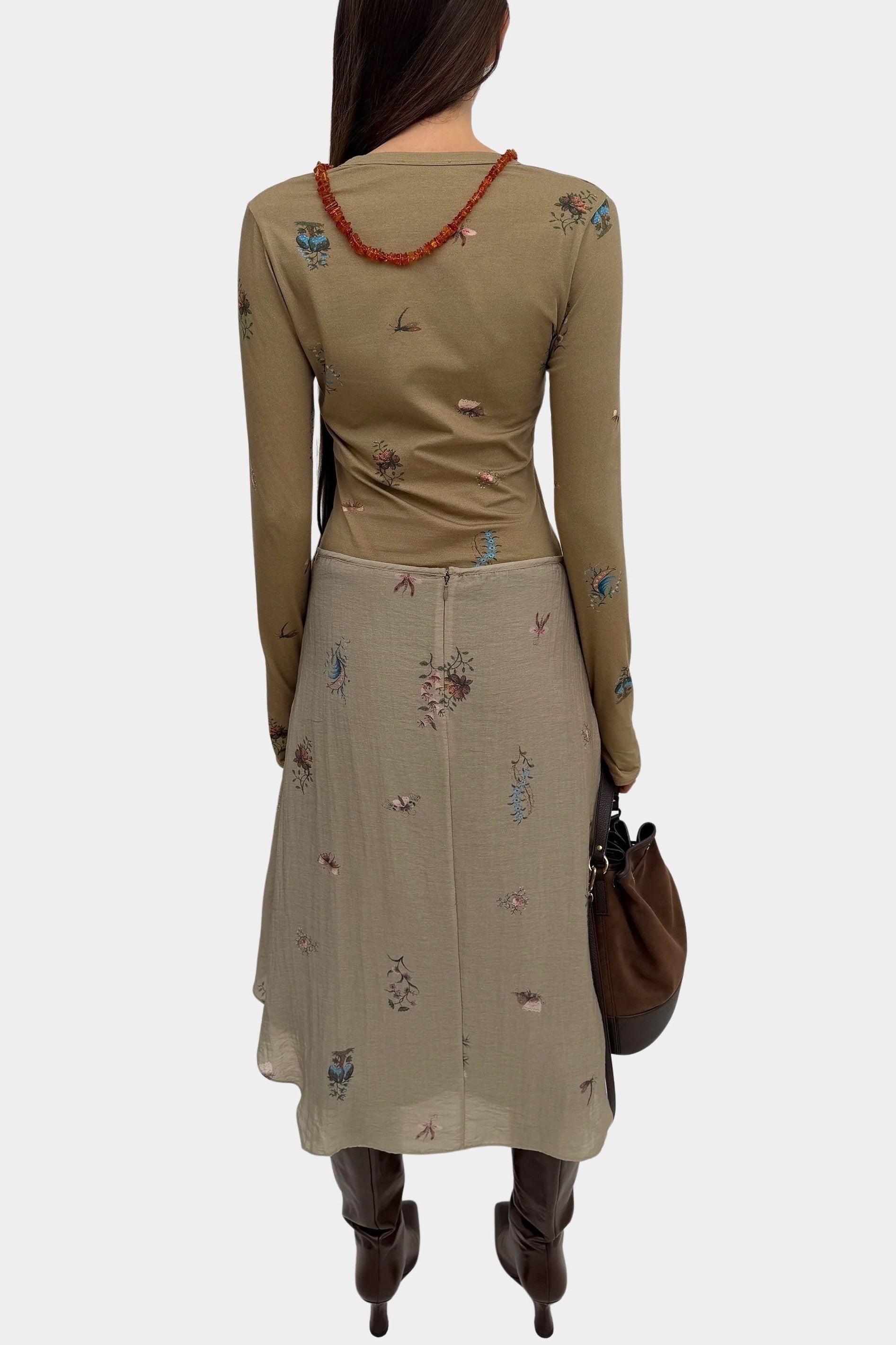 Rodebjer Kiara Henley top in beige multi duchess floral print, back view showing slim fit and long sleeves styled with coordinating skirt