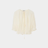 Rodebjer Perla Plissé blouse Gardenia Cream short sleeve button front blouse