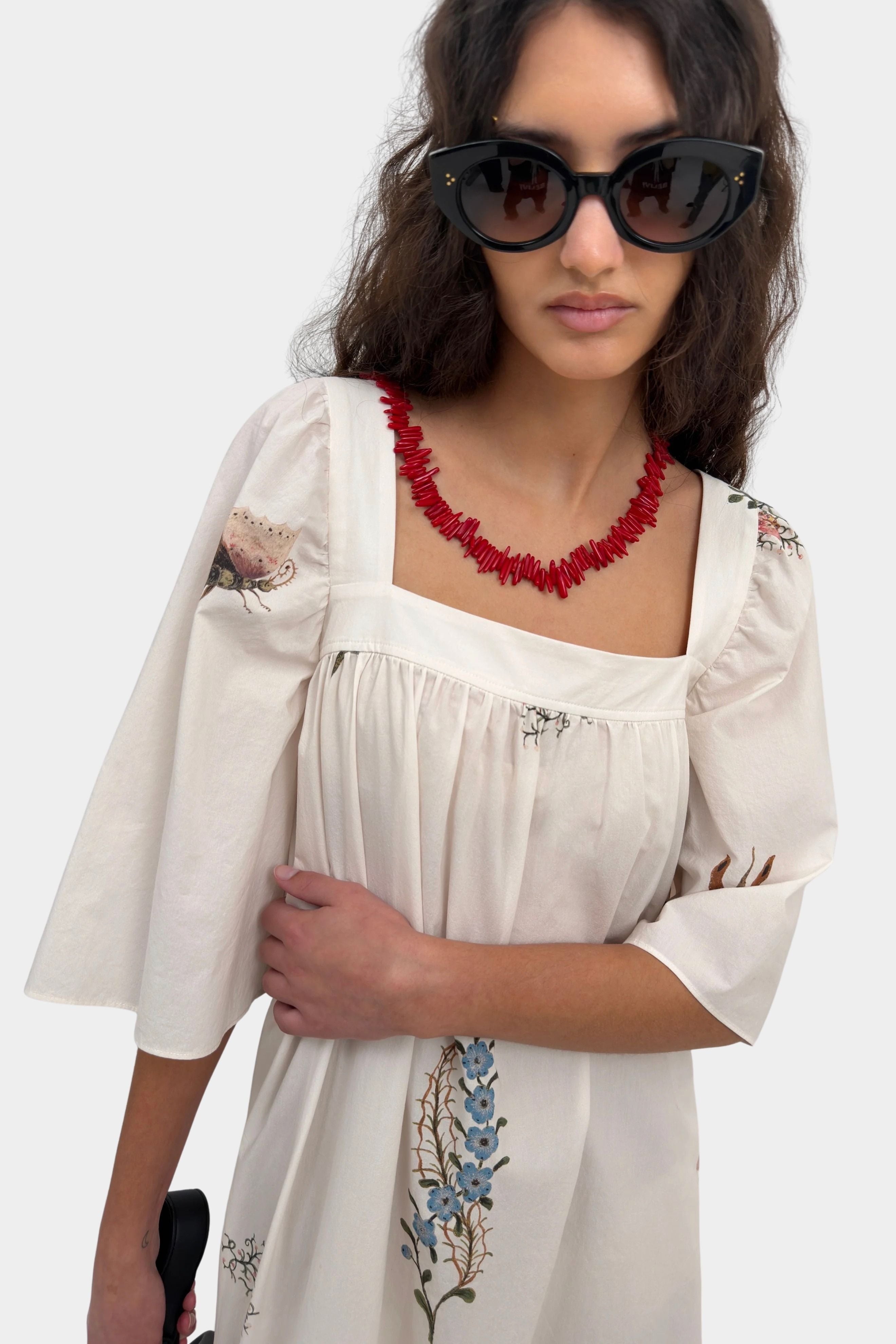 Rodebjer Salem square neck dress cream multi floral front detail model wearing sunglasses YUCCA Denver