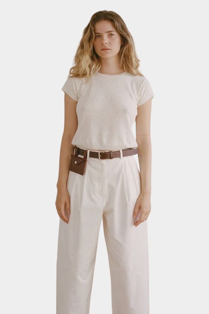 Shaina Mote Baby Tee Chalk full look fitted cream tee with relaxed ivory trousers and brown belt styling