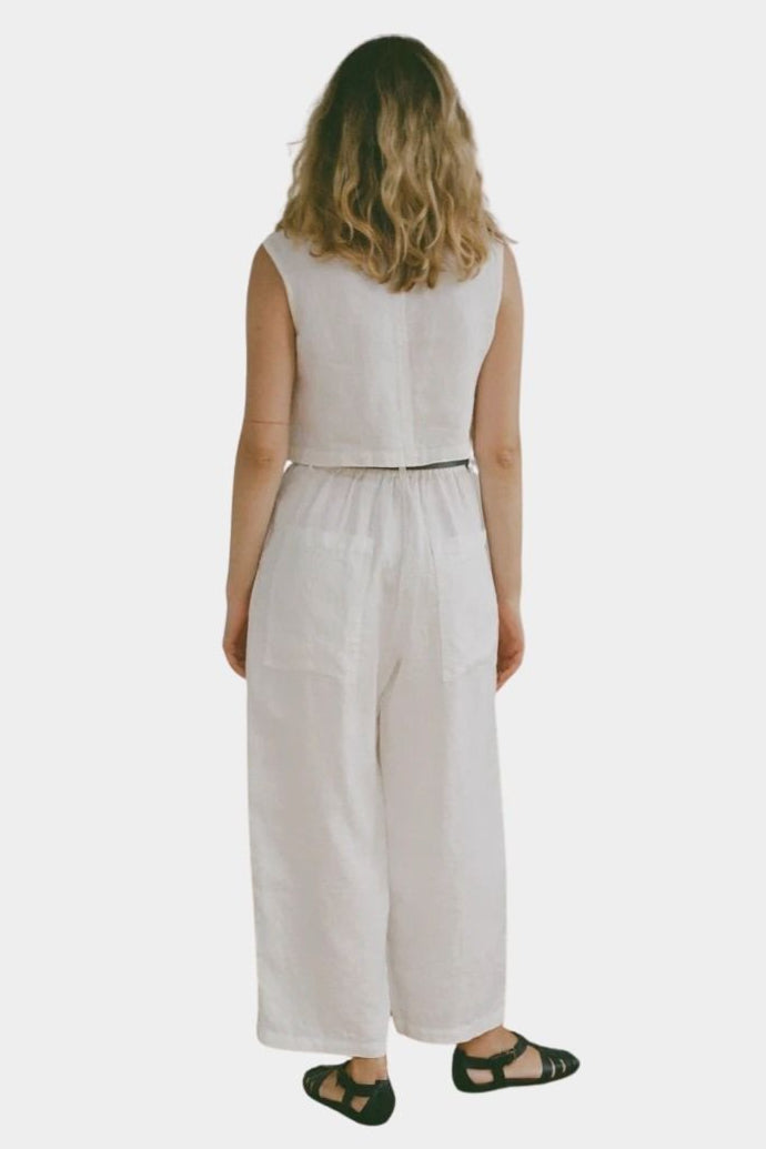 Shaina Mote Cielo linen top in natural back view with cropped sleeveless fit and straight hem