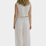 Shaina Mote Cielo linen top in natural back view with cropped sleeveless fit and straight hem