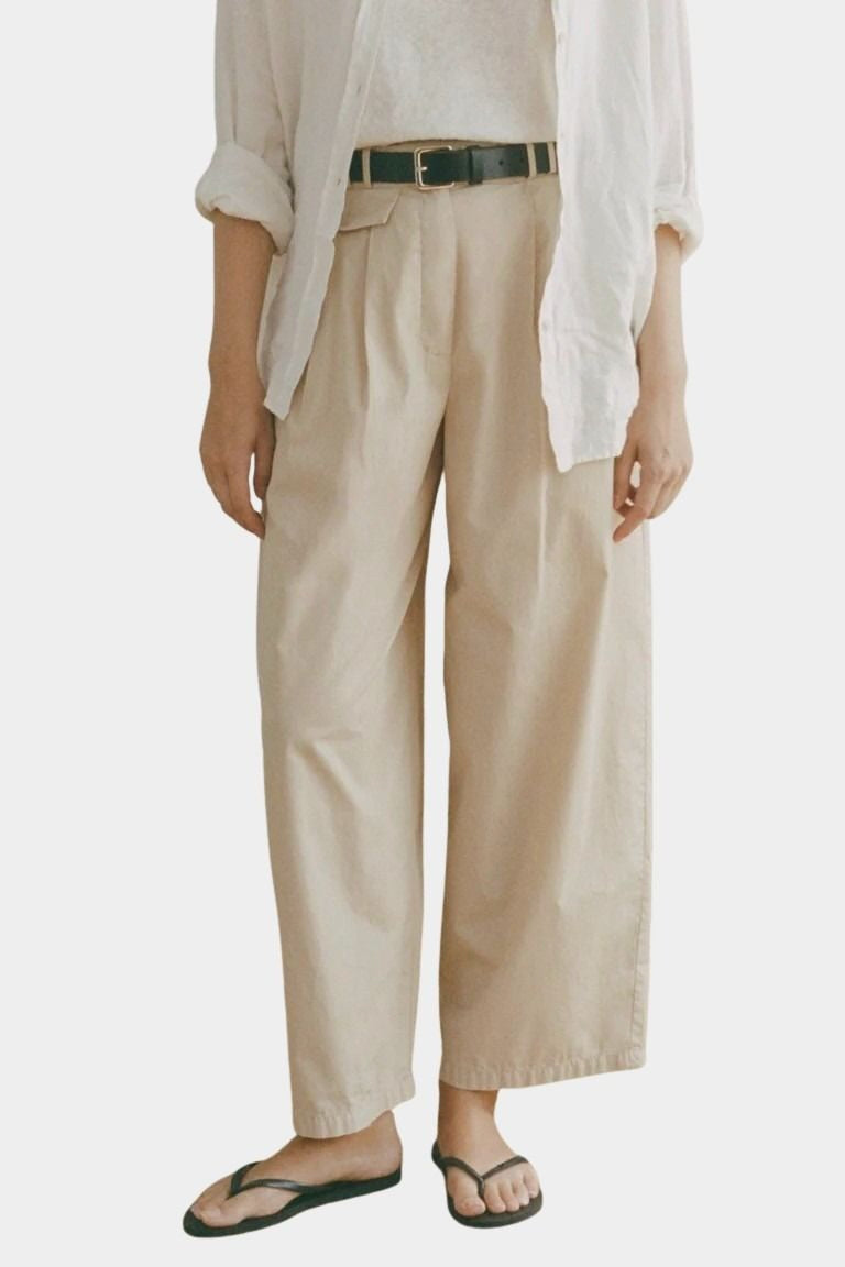 Shaina Mote Summer Chino Beige front view pleated high rise wide leg cotton pant with sandals