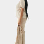 Silk Laundry bias cut silk pants in hazelnut side silhouette view