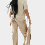 Silk Laundry hazelnut silk satin bias pants worn with silk shirt