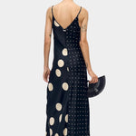 Silk Laundry silk slip dress in black and cream polka mix back view