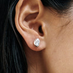 Bean Stud Earrings Sterling Silver Wolf Circus worn on ear close up sculptural silver stud earrings