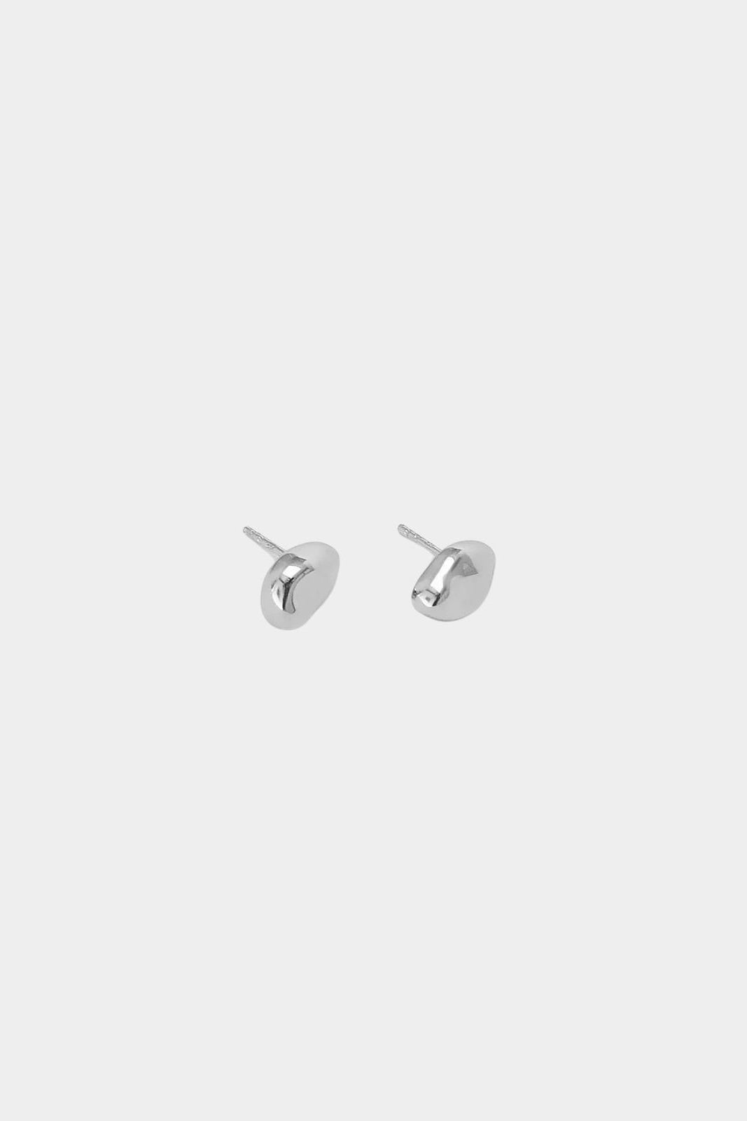 Bean Stud Earrings Sterling Silver Wolf Circus product flat lay sterling silver stud earrings pair