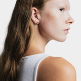 Bean Stud Earrings Sterling Silver Wolf Circus side profile worn minimal silver stud earrings