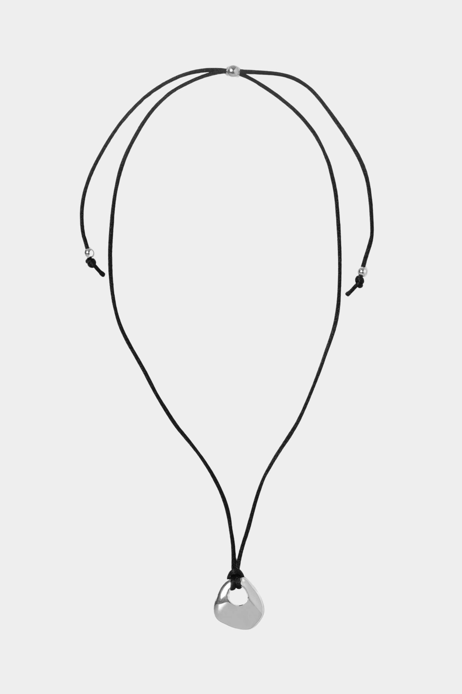 Wolf Circus Devon necklace silver adjustable black cord full necklace flat lay